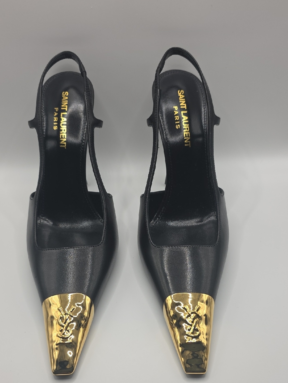 Saint Laurent Black Leather Slingback Pumps with Gold Toe Caps